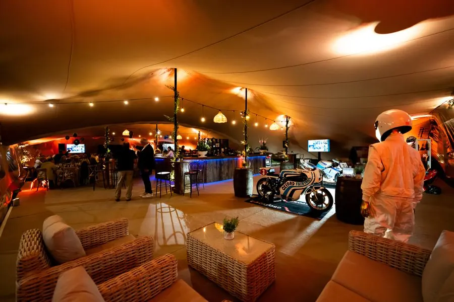 Marquee interior lounge with motorcycle display
